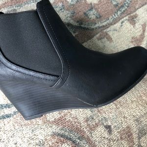 Like new back wedged shoes. ONLY WORN ONCE.